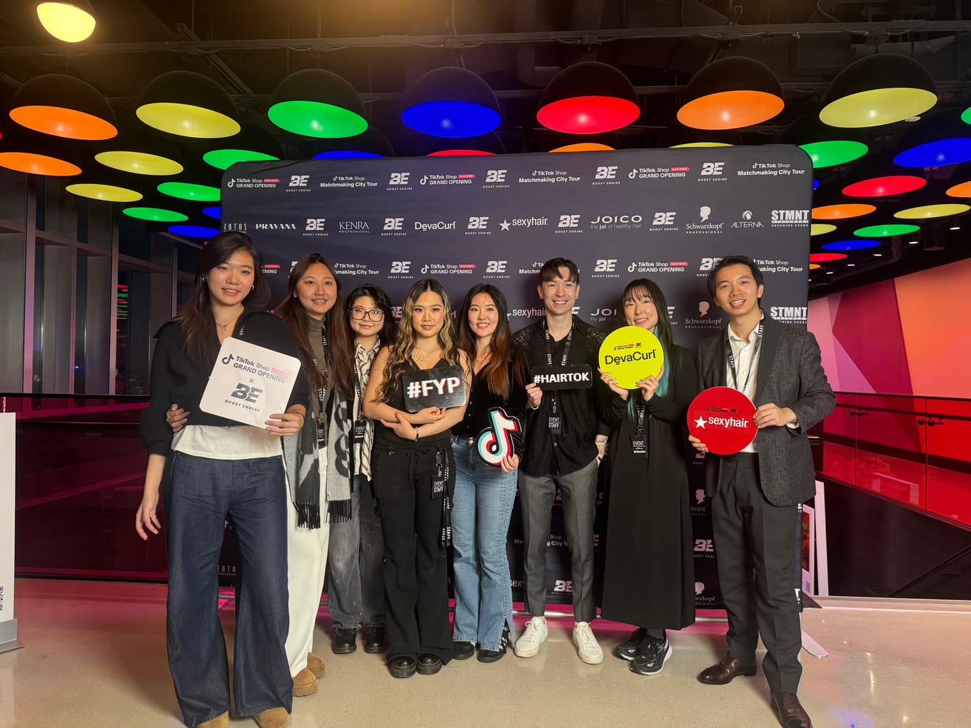 Team group photo at a TikTok Shop event